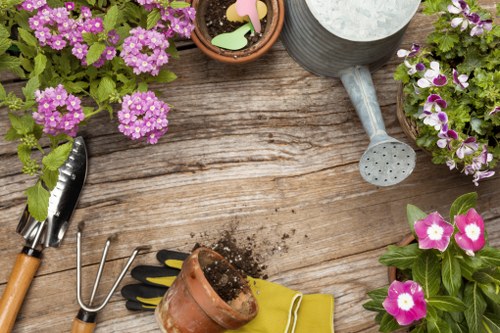 Team of gardeners starting a green waste sorting area in Brent Cross